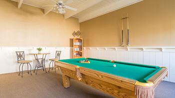 Riverstone clubhouse with pool table and lounging area